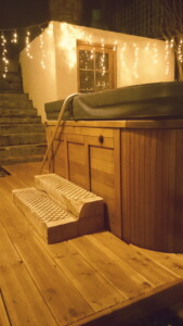 Soothe tired limbs in the hot tub...