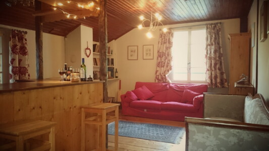 Spacious, well stocked bar The bar at Chalet La Moussiere