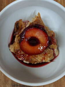 Rice pudding with baked plums